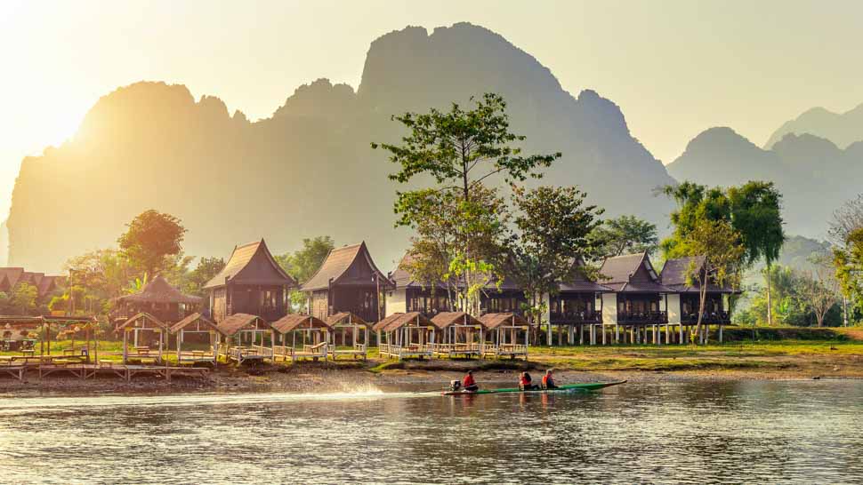 Village and bungalows Nam Song River in Vang Vieng, Laos.