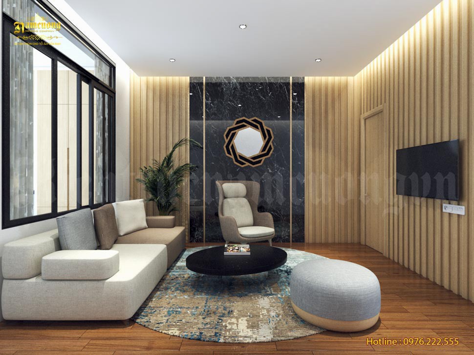 Phòng chờ của spa có thể được tận dụng làm phòng khách gia đình sáng sủa, hiện đại với tone màu ghi xám.